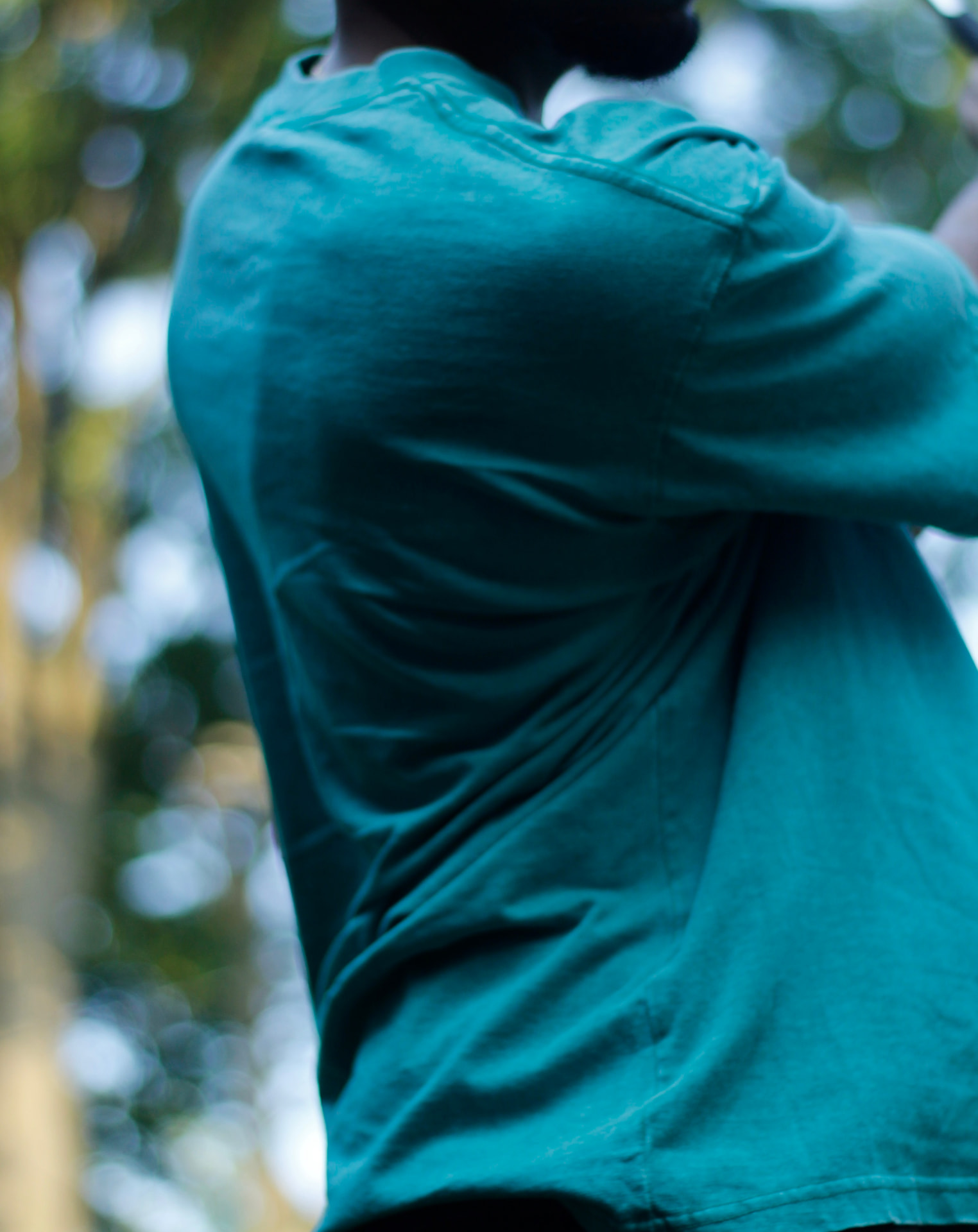 Teal In The Moment tee shown from behind